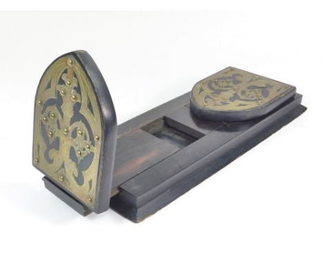 BOOK TROUGH. A Victorian brass mounted extending book trough. Width, fully extended, 55cm.  Please note that all items in thi