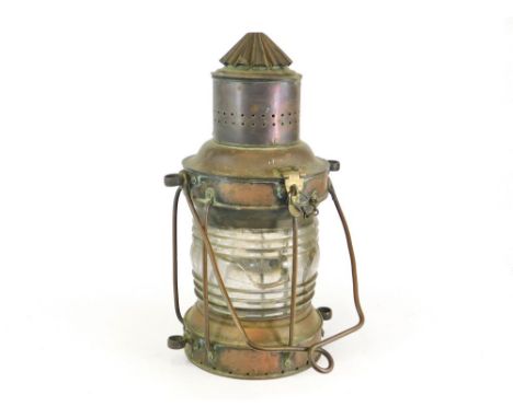 NIGHT MAST LAMP. A copper & brass night mast lamp, unmarked. Original burner. Max. height 68cm. (Glass cracked).  Please note