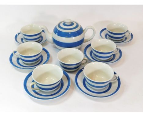 CORNISH WARE. A T.G. Green Cornish Kitchen ware teapot with seven large breakfast cups & six saucers. All with green shield b