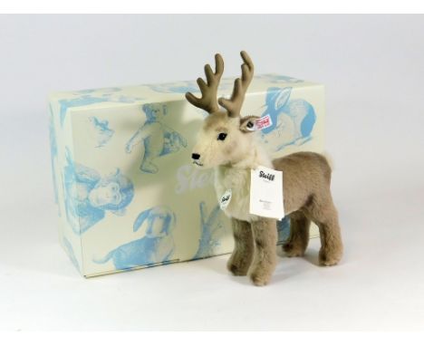 STEIFF. A Steiff Alpaca Renny Reindeer c.2012. Numbered to the ear button 00005. Original tags, CoA & inner & outer box.  Ple