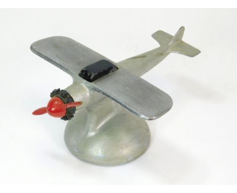 MONOPLANE TABLE LIGHTER. A cast aluminium c.1930's monoplane table lighter by Demley, USA. Note: all lighters are used & cann