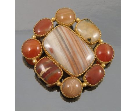 An early Victorian agate gilt metal brooch, together with a pair of  metal cufflinks, a pocket compass, and a gilded copy of 
