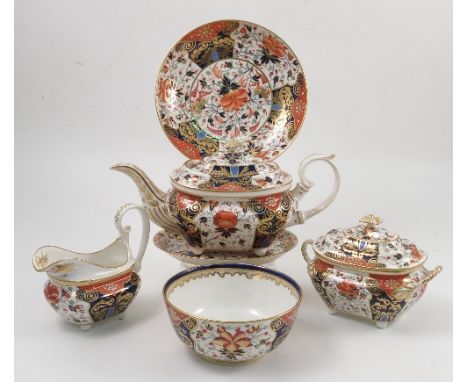 A 19th century Derby porcelain part service, comprising eleven tea cups, eleven coffee cans, eleven saucers, two plates, one 