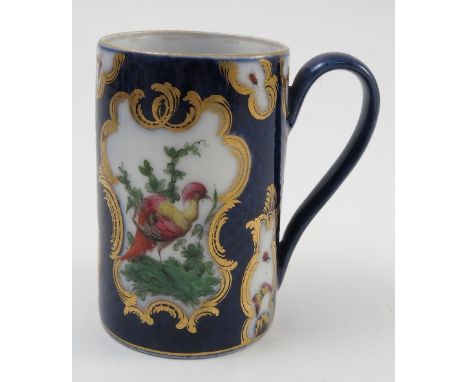 A 19th century Sampson of Paris mug, decorated in the Worcester style of reserves of fabulous birds and insects to a scale bl