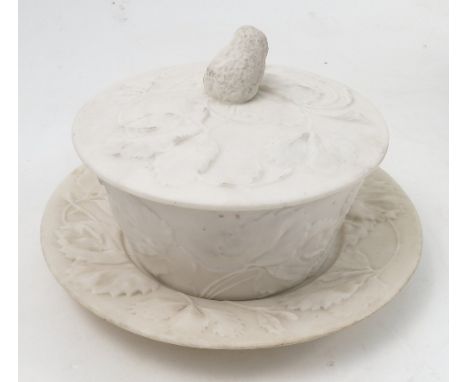 A Worcester bisque porcelain covered bowl and stand, with strawberry finial and embossed with strawberry leaves, marked in bl