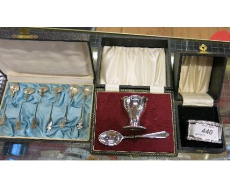 A cased silver egg cup and spoon, the egg cup engraved with initials, Birmingham 1964, weight 1oz, together with a cased hall