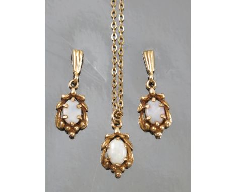 An opal pendant and earring set, in 9ct gold, cased