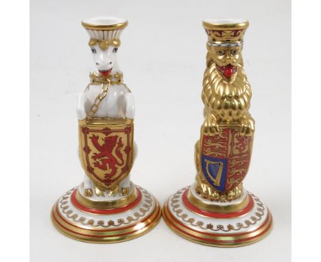 A pair of Mintons Queens beast candlesticks, of a lion and unicorn holding heraldic shields, of a limited edition of 250, hei