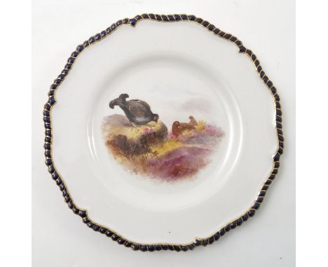 A Royal Worcester cabinet plate, hand painted with game birds, in landscape by George Johnson, dated circa 1910, diameter 9in