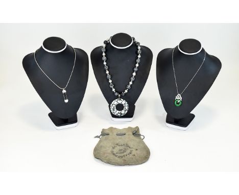 Collection Of Costume Jewellery To include three necklaces, the first a resin statement necklace in black, grey and mother of