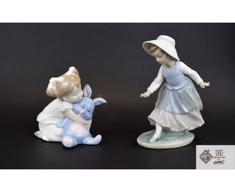 Nao by Lladro Figures ( 2 ) 1/ Young Girl with Large Rabbit Figure, Model No 1263. 5.5 Inches High, Mint Condition. 2/ Young 