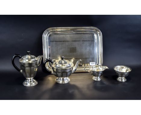 Sheffield Steel Tea And Coffee Service Early 20th century stainless steel serve ware to include tray, coffee pot, tea pot, cr