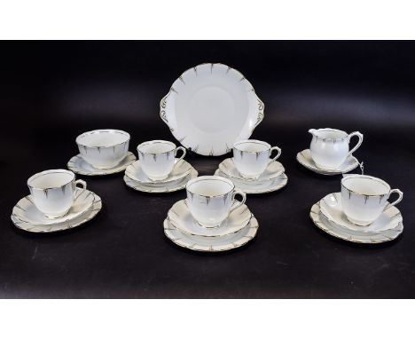 Royal Albert Gilt White Tea Service (21) pieces in total. Includes cups, saucers, side plates, 