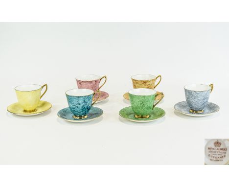 Royal Albert Gossamer Teacups Six in total, each with matching saucers, elegant form with gilt banding to handles and unusual