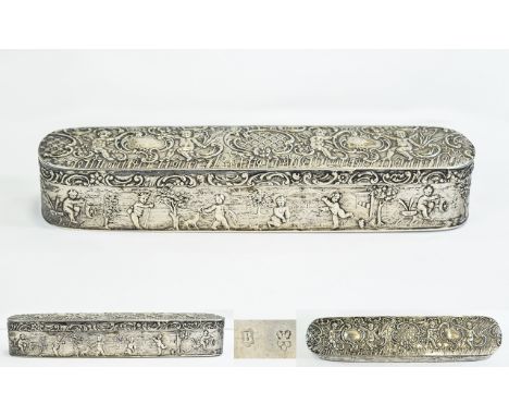 A Fine and Ornate 19th Century - European Silver Lidded Elongated Trinket Box. Profusely Decorated with Embossed Images of Ch