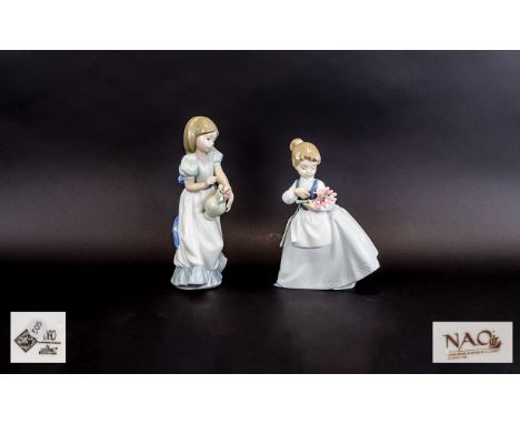 Nao by Lladro Figurines ( 2 ) Young Girls with Bunches of Flowers. Both Figures are In Mint Condition. Sizes 7.5 & 8.5 Inches