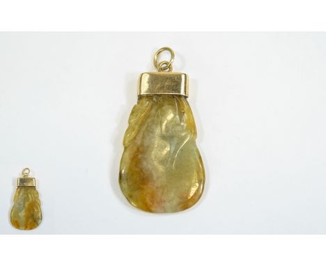 A Vintage Excellent Quality Gold Mounted Jade Pendant, The Colour way In Browns and Greens. The Gold Mount Is Not Marked, But