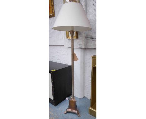 STANDARD LAMP, the reeded silvered column on a triform base with a cream shade, overall 170cm H. 