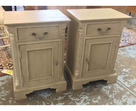 BEDSIDE CABINETS, a pair, grey painted with single drawer over cupboard door on bracket supports with reeded canted edges, 67