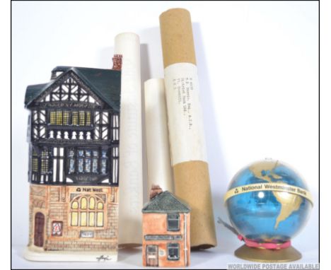 A collection of vintage National Provincial Bank / Nat West items from an ex employee to include money box, certificates etc 
