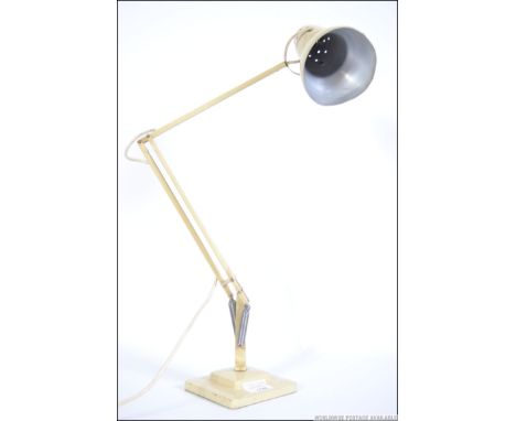 A vintage Herbert Terry anglepoise 1227 model Industrial desk lamp raised on square terraced base with pendant shade