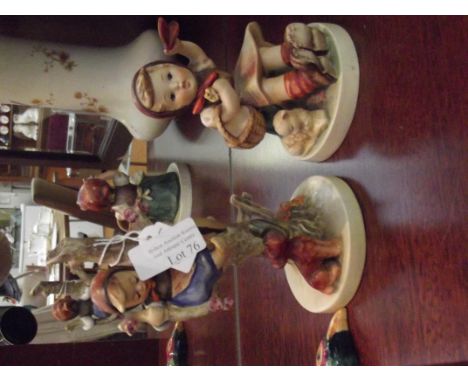 Two Hummel figures