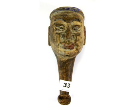 A Chinese hand painted and carved wood hand puppet, H. 20cm.