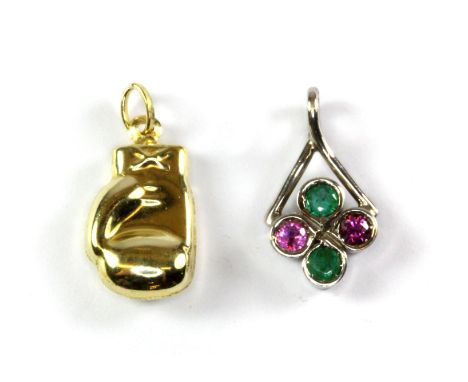 A 9ct white gold pendant set with emerald and pink topaz, together with a 9ct yellow gold boxing glove shaped pendant, L. 1.8