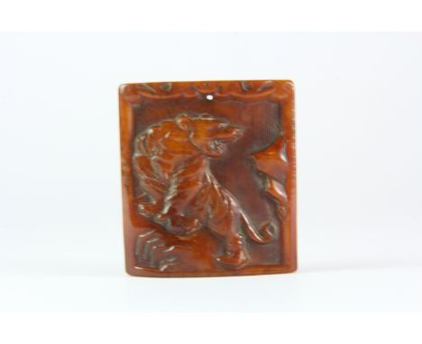 A Chinese carved bone tiger amulet, 4.5 x 5cm.
