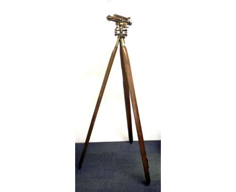 A large Stanley brass surveyors level and tripod, H. 159cm.