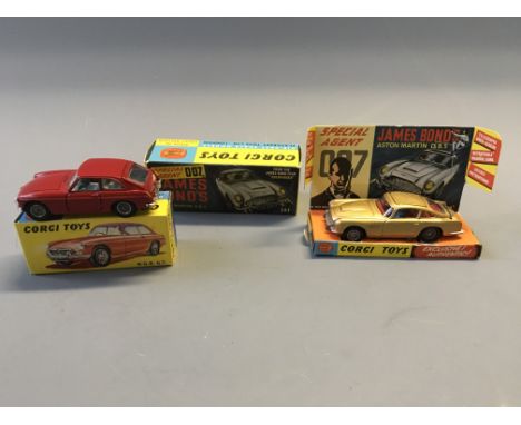 A Corgi 327 M.G.B. G.T. and 261 James Bond's Aston Martin D.B.5, in boxes. (NO CONDITION REPORT, VIEWING OF LOT ADVISED.)