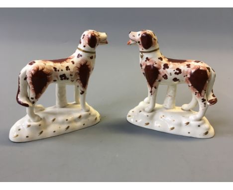 A pair of Staffordshire dogs.