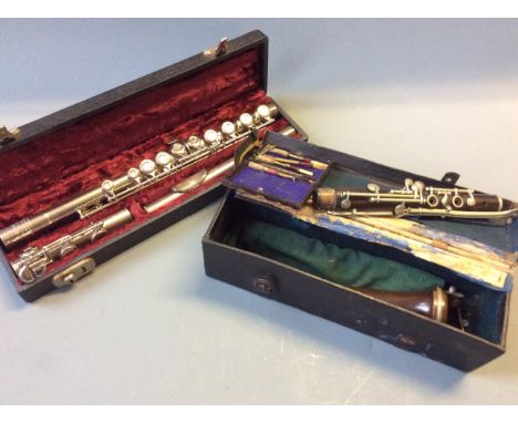 A Romilly student made for Russell Clarke & Co. flute in case with clarinet in case.