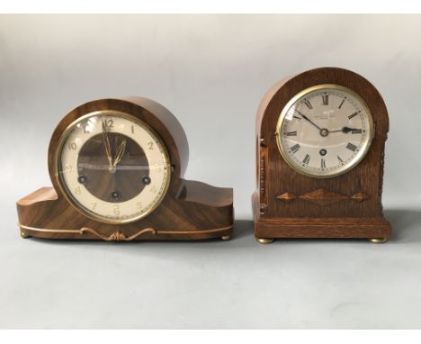 A Bracher & Sydenham oak cased mantel clock with a Bentina walnut cased mantel clock. Heights 23cm and 20cm.