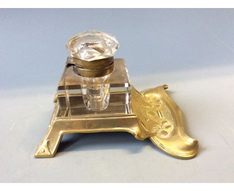 A brass art nouveau style inkwell.