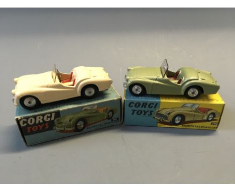 A Corgi 305 T.R.3 sports car and 301 triumph T.R.2 sports car, in boxes. (NO CONDITION REPORT, VIEWING OF LOT ADVISED.)