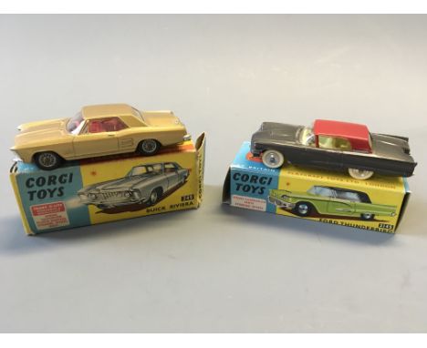 A Corgi 245 Buick Riviera and 2145 Ford thunderbird, in boxes. (NO CONDITION REPORT, VIEWING OF LOT ADVISED.)