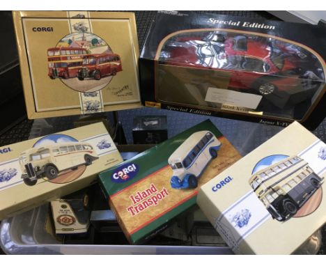 Various boxed diecast model vehicles including Corgi buses, Jaguar X Type Special edition, etc.