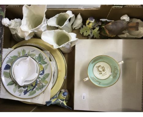 White Royal Worcester jugs and figures, various wall plates and Royal Worcester bird ornaments.