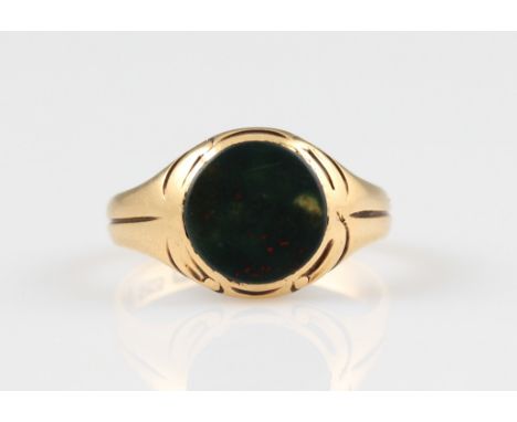 A Victorian 18ct yellow gold bloodstone signet ring, set with a circular piece of bloodstone, hallmarked Birmingham 1866, rin