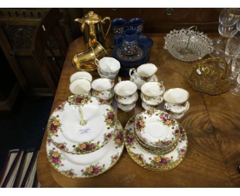 An Old Country Rose part tea set with Winterling part tea set and Royal Worcester gold part tea set.