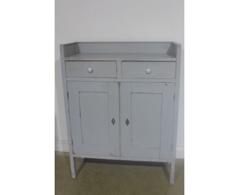 An unusual Art Deco period two door two drawer cupboard in original grey paint with key for door - 130cm x 100cm x 42cm 