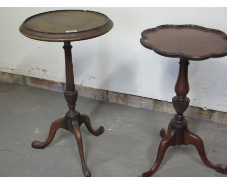 Two 20th century walnut an mahogany wine or sherry tables with shaped circular tops, carved supports on tripod bases