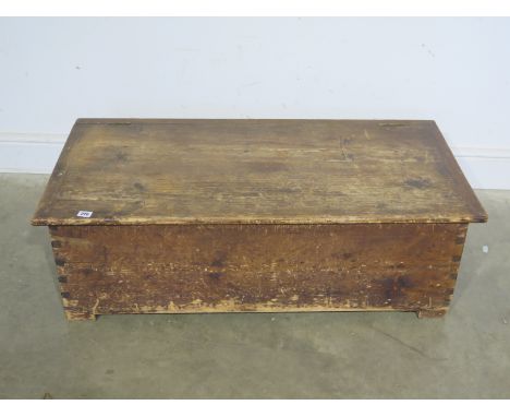 A late 19th century pine rectangular trunk with lift up lid - 34cm x 107cm x 52cm
