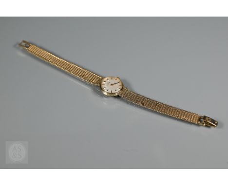 A vintage ladies Omega 9ct gold bracelet wristwatch, the mechanical movement with oyster dial and baton markers, 24.7g all-in