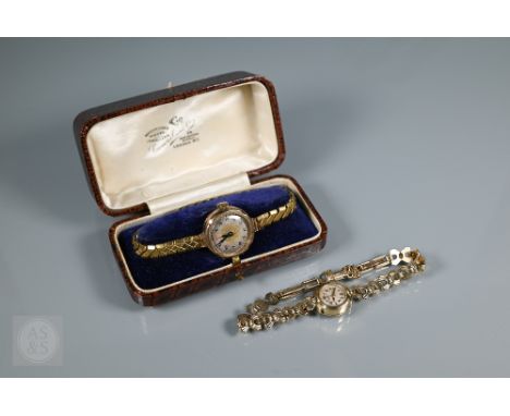 A vintage ladies Rotary 9ct gold wristwatch, fitted with an integral bracelet, approx. 15.3g all-in to/with a a ladies 9ct go