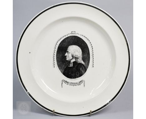 A Georgian creamware commemorative plate, transfer-printed with a portrait of 'John Wesley A.M., from the European Magazine',