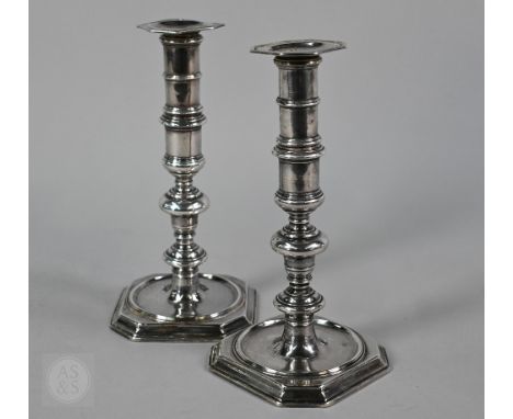 A pair of James II cast silver baluster candlesticks, the dished square bases with canted corners, Peter Harache, London 1685