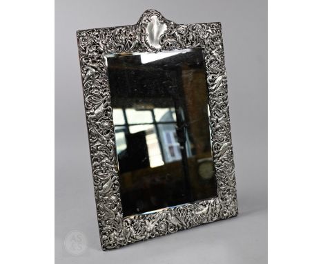 A late Victorian large easel mirror with pierced and embossed silver surround, William Comyns &amp; Son, London 1900, 50 x 35
