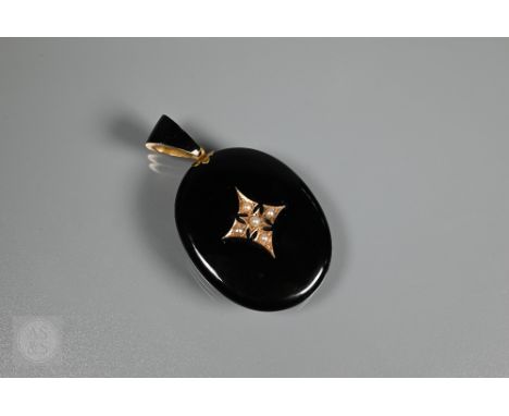 A Victorian mourning locket with black enamel decoration, inset seed pearls and vacant locket to reverse, 6cm long including 